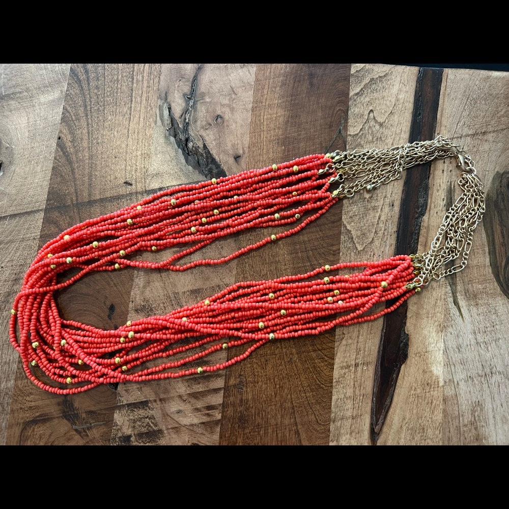 Beaded orange and gold tone layered necklace. Seed beads. Vintage. 23-27” long
